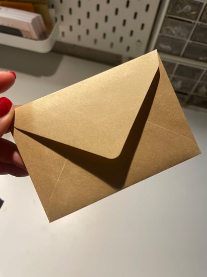 كرت مع كتابه الملاحظه