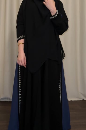 عبايه ( N86 ) شك فضي مع كسرات ابيض