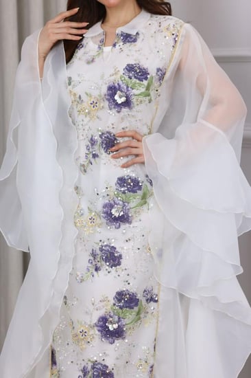 جلابية بخامة اورجنزا والتل المطرز بالورود الجميلة