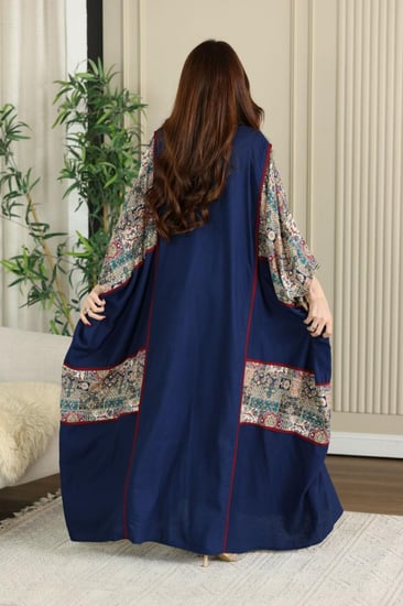 جلابية لينن فراشة بتطريز شك يدوي في الصدر ممزوجة بقماش مشجر