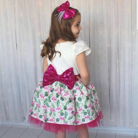 فستان بناتي مع فيونكة للشعر