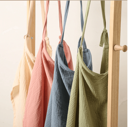 غطاء رضاعة بألوان الباستيل