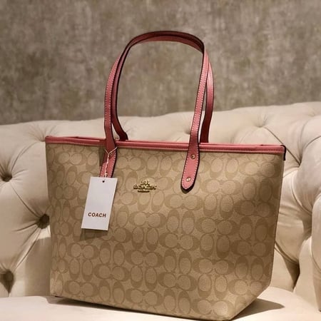 حقيبة كوتش مسكات وردي فاتح