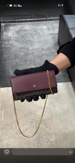 شنطة كارولينا هيريرا/واليت