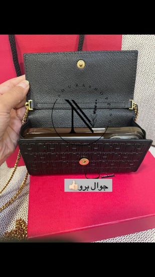 شنطة كارولينا هيريرا/واليت