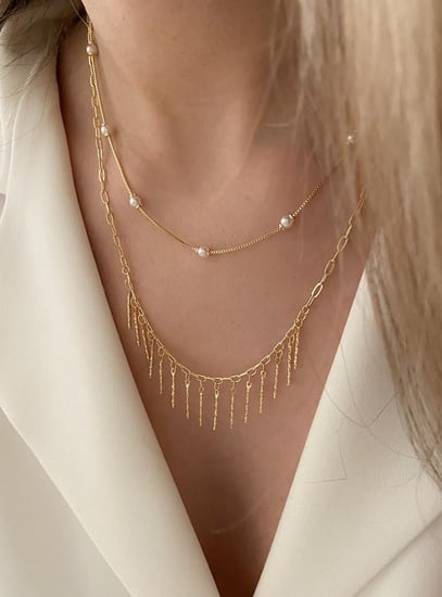 سلسال مزدوج عبارة عن سلسلتين مطلي ذهب.                    MN-099