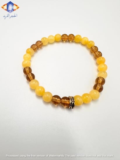 سوار حجر الكهرمان الأصفر مع حجر الكهرمان العسلي الطبيعي الكريم .