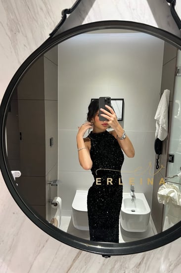 فستان اورقيت اسود