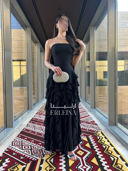 تصميم فستان اسود ساده طويل للبنات والنساء.