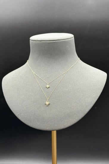 عقد دورين زهرة ذهب تصميم الماس عيار 18 وزن 0.8 جرام