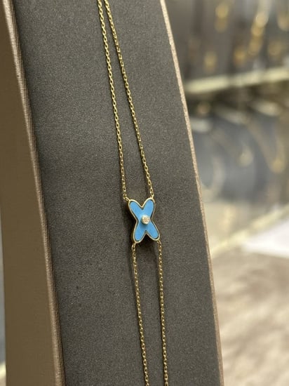 اساور ذهب ايطالي موديل اكس فيروز اللون اسوارة ذهب انيقة تبرز جمالك