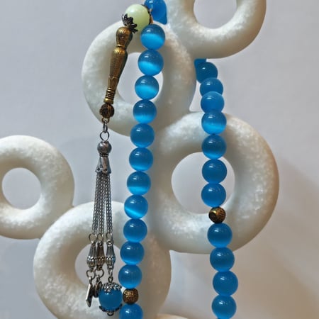 عقيق عين القط ازرق فاتح