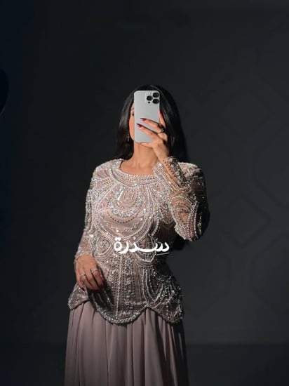 فستان سهرة مطرز أكمام طويله