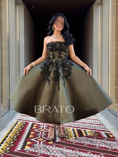 فستان زيتي ميد بتفاصيل أنيقة وحديثة