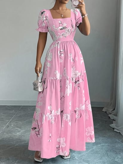 فستان نسائي أنيق وعصري متوسط الطول بطبعة زهور وبتصميم ملفوف