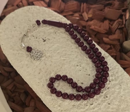 سبحة بكلايت لون عنابي