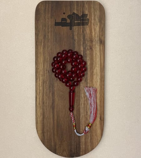 مسباح بكلايت أحمر شفاف مع كركوشة