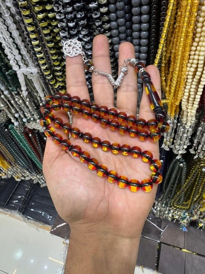 مسباح بكلايت اصفر شفاف طربزونة معدن