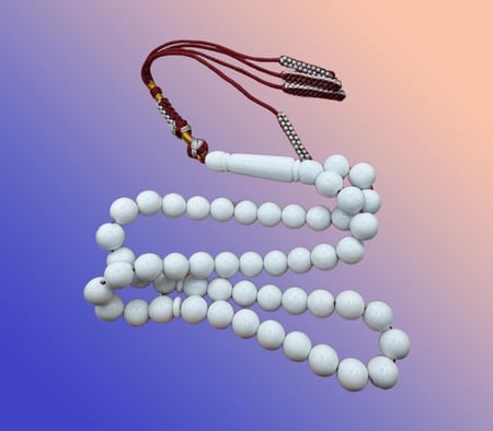 مسباح بكلايت طربزونه 51 خرزه مقاس 10mm باللون الأبيض