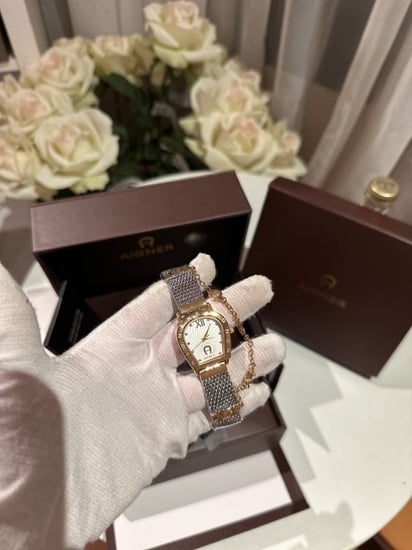 ساعة اقنر فضي وذهبي