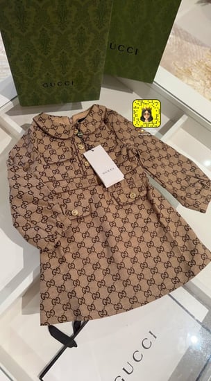 فستان قوتشي بأكمام طويله