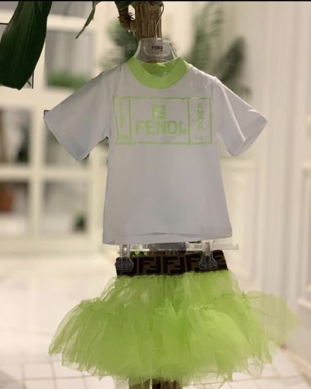 طقم فندي تنورة تل غير مبطنه+ تيشيرت (بدون لوقو)