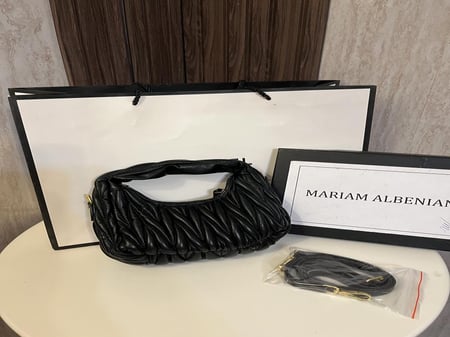 حقيبة ميو ميو بناتي