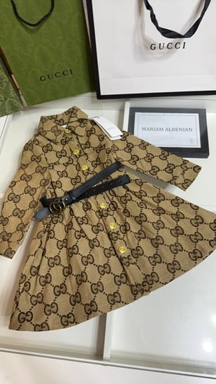 فستان قوتشي بشكل جاكيت مع حزام