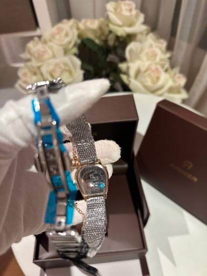 ساعة اقنر فضي وذهبي