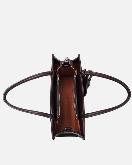 شنطه بتصميم عصري بلون أسود وبني