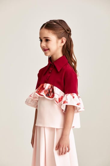 بلوزة موردة بكشكش