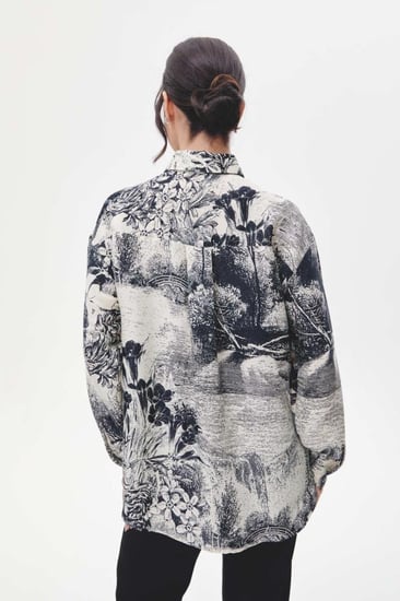 قميص واسع بنقوش موردة