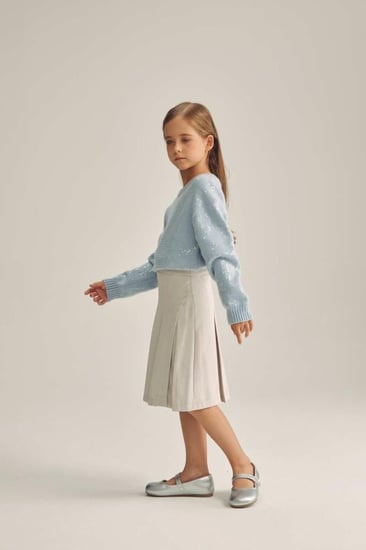 تنورة مزينة بكسرات