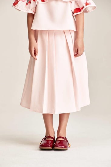 تنورة سادة بكسرات