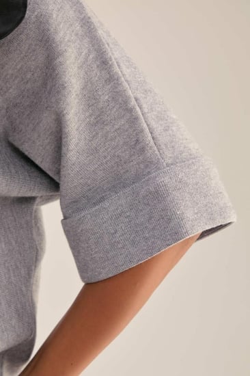 بلوزة مزينة بوردة اروجنزا