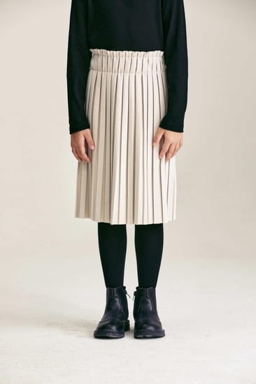 تنورة مخمل واسعة بكسرات