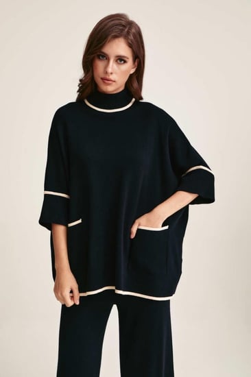 بلوزة واسعة بجيوب