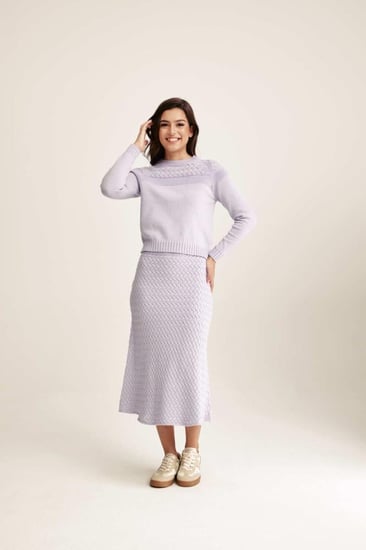 كنزة بتفاصيل لامعة