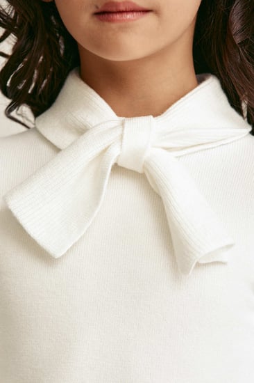 بلوزة محبوكة بياقة بربطة