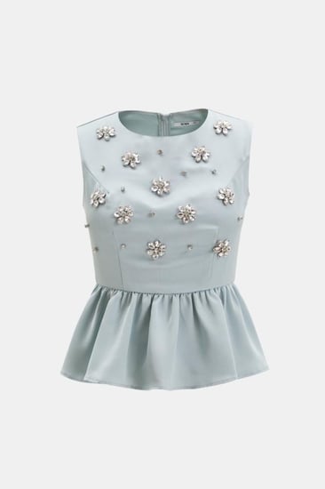 بلوزة بيبلوم مزينة بالكريستال