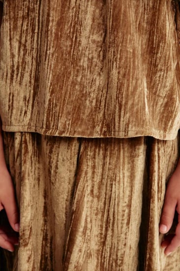 تنورة مخمل بقصة كلوش