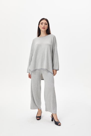 بلوزة واسعة بنقوش متعرجة