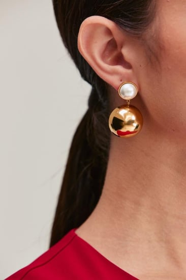 حلق متدلي بتصميم كروي