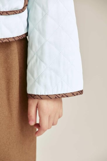 جاكيت مُبطن بياقة مكشكشة