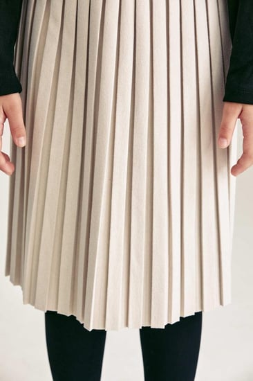 تنورة مخمل واسعة بكسرات