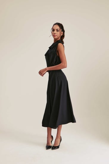 تنورة ميدي مزينة بكسرات