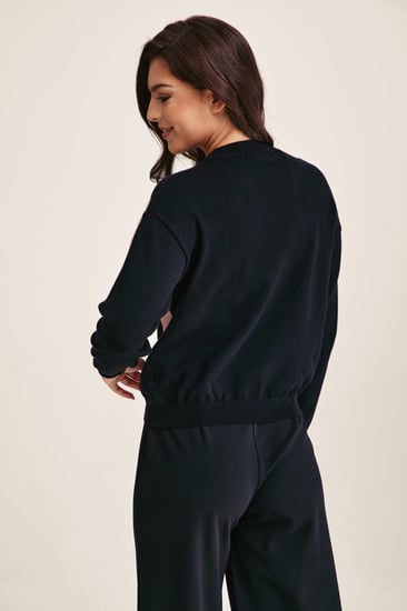 كنزة مزينة بالترتر