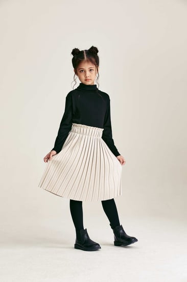 تنورة مخمل واسعة بكسرات