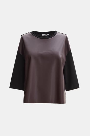 بلوزة بتفاصيل جلد