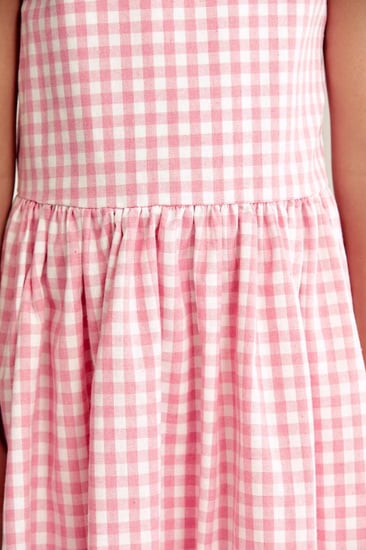 فستان كاروهات بلا أكمام